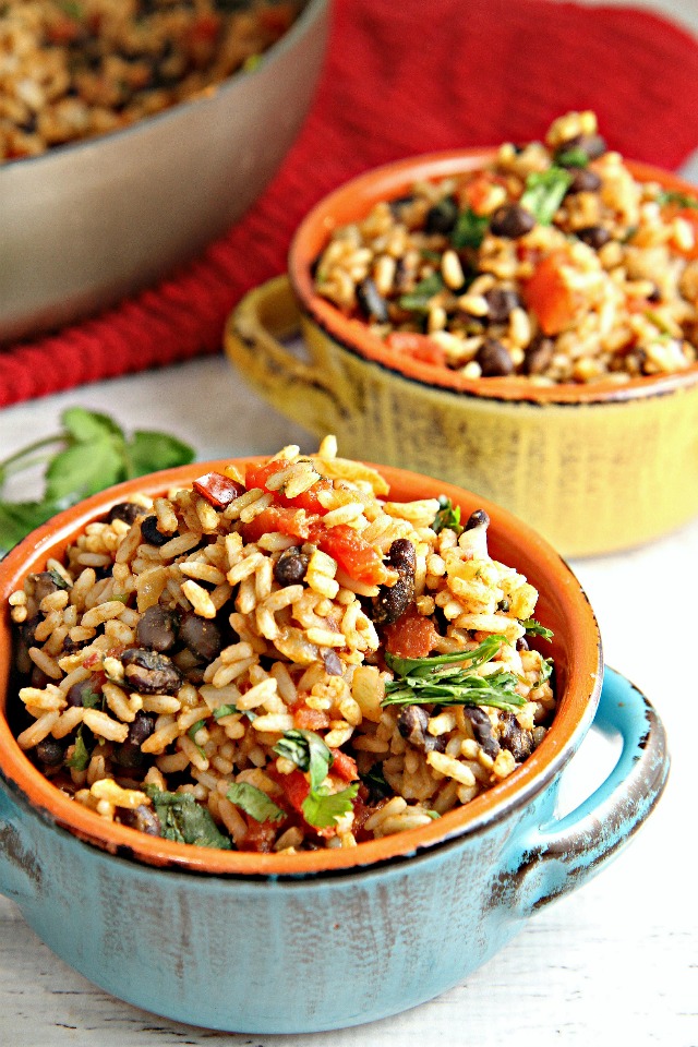 Mexican Rice and Beans...an easy versatile vegetarian dish! Use it as a side dish for Mexican night, use the leftovers as a filling for burritos along with chicken or beef, or add cheese and turn it into a Mexican bake.