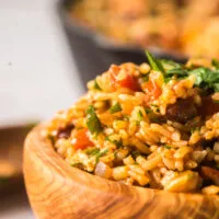 zoomed in side view of mexican rice in bowls, ready to serve.