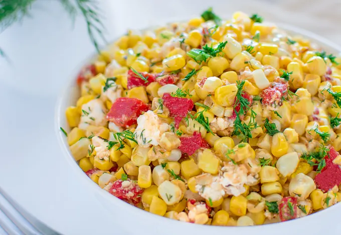 Quick and colorful Corn and Feta Salad is perfect for picnics and hot summer days. Serve this salad as an appetizer, a topping for whole grains or as a salsa with grilled chicken or fish.