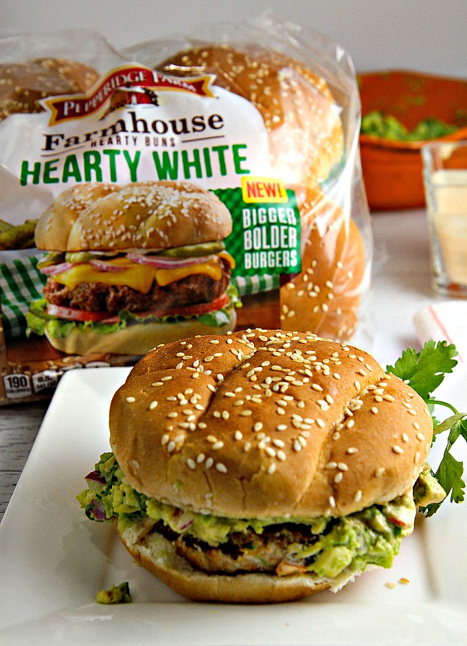 Add a Tex-Mex flair to your next summer BBQ! This Chicken Burger is LOADED with flavor, grilled to perfection, piled high with smashed avocado and smothered in chipotle mayo...perfect recipe for the grilling season!