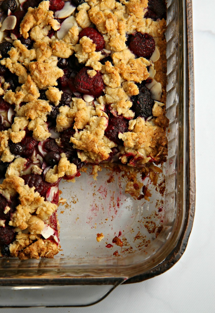 This easy Berrylicious Bar Cookies recipe is a delicious snack recipe, sure to be a new family favorite! They're also a great dessert to bring to potlucks, and with the red and blue berries, they're great for the 4th of July too! 