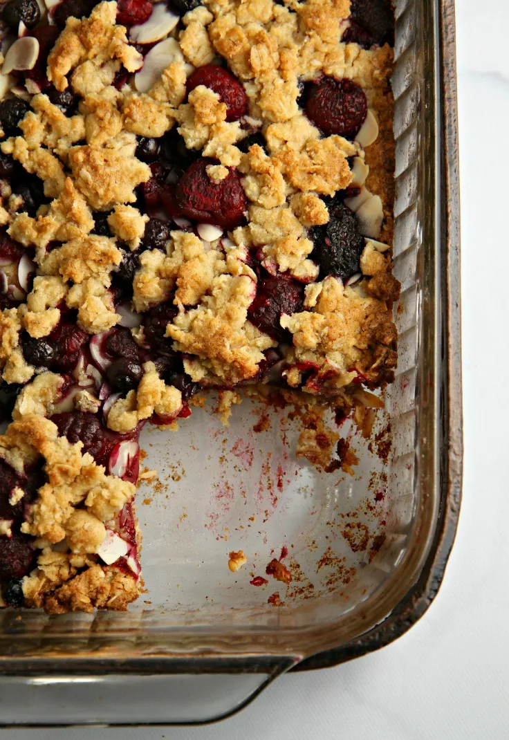 This easy Berrylicious Bar Cookies recipe is a delicious snack recipe, sure to be a new family favorite! They're also a great dessert to bring to potlucks, and with the red and blue berries, they're great for the 4th of July too! 