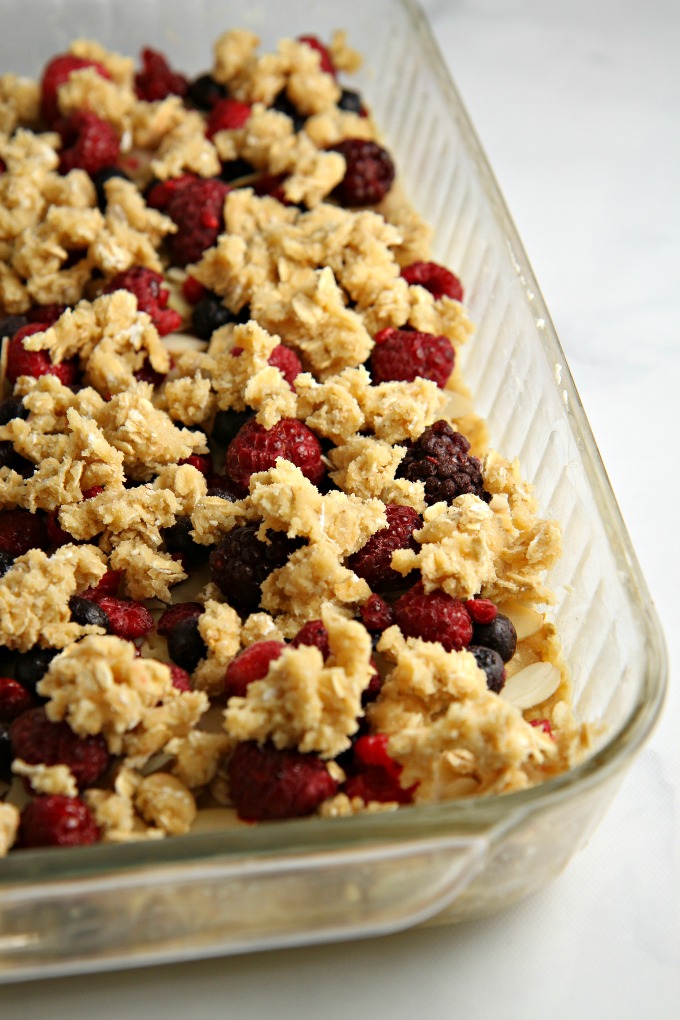 This easy Berrylicious Bar Cookies recipe is a delicious snack recipe, sure to be a new family favorite! They're also a great dessert to bring to potlucks, and with the red and blue berries, they're great for the 4th of July too! 