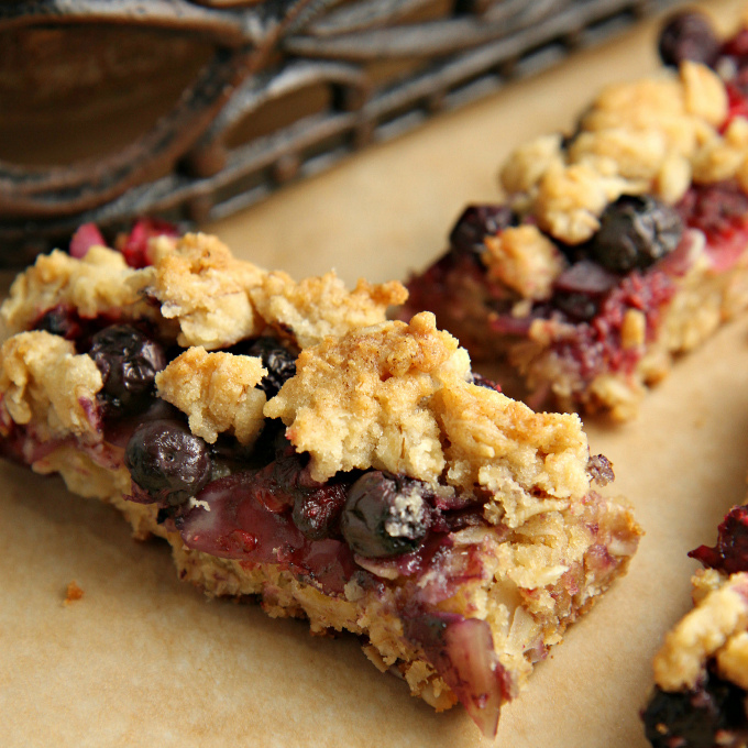 This easy Berrylicious Bar Cookies recipe is a delicious snack recipe, sure to be a new family favorite! They're also a great dessert to bring to potlucks, and with the red and blue berries, they're great for the 4th of July too! 