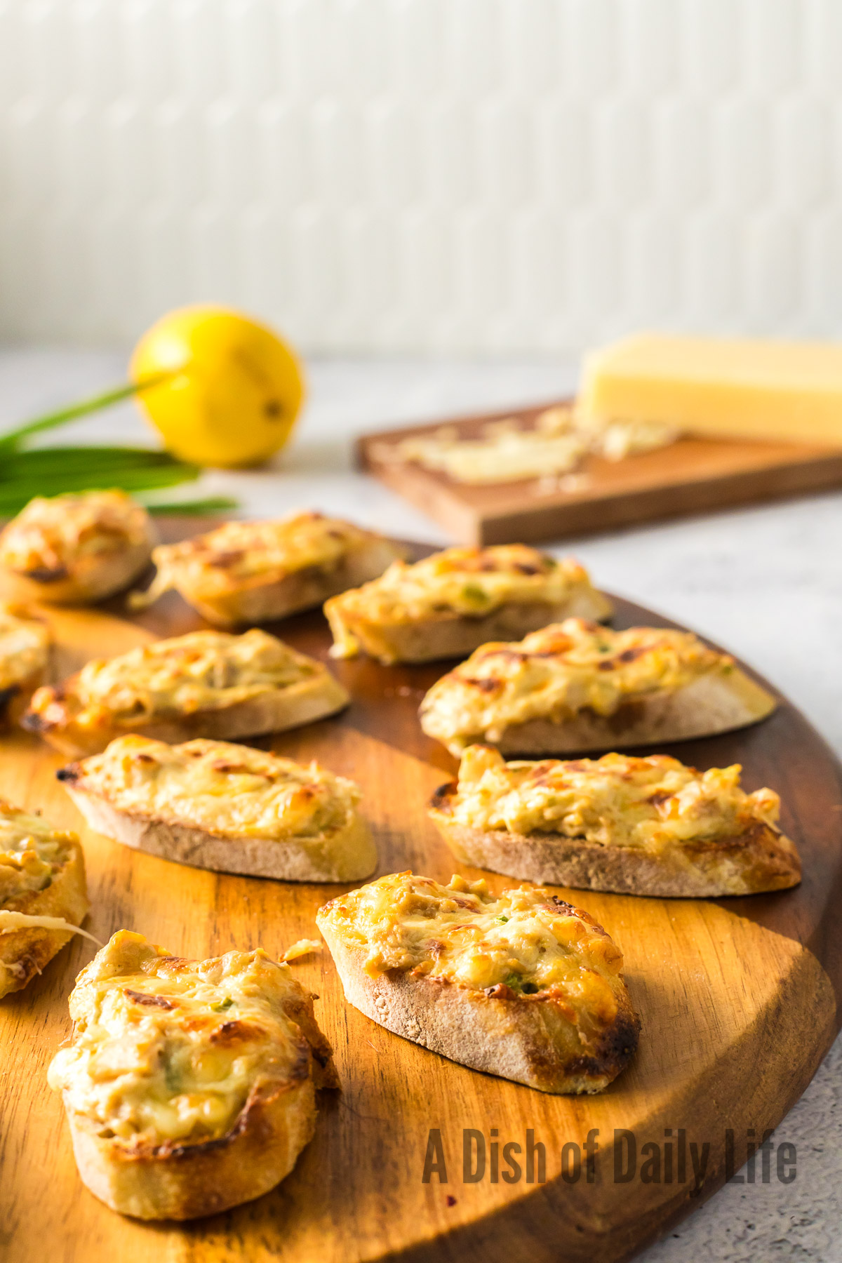 side view of clam bruschetta on platter