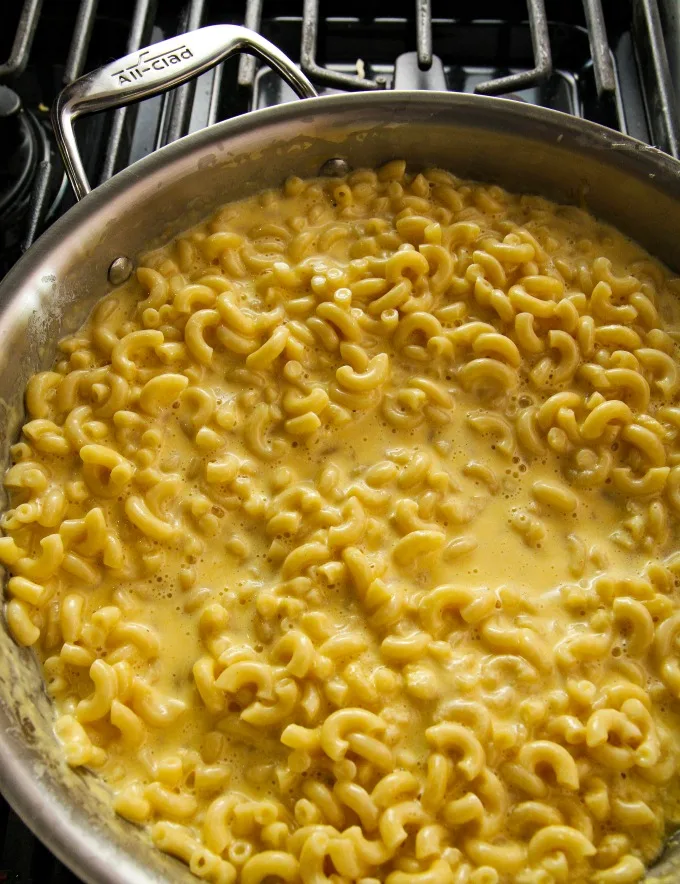 Always a crowd favorite, this Homemade Mac and Cheese recipe is a comfort food classic! Quick and easy to make, with only 5 ingredients, it's perfect for potlucks or a weeknight dinner.