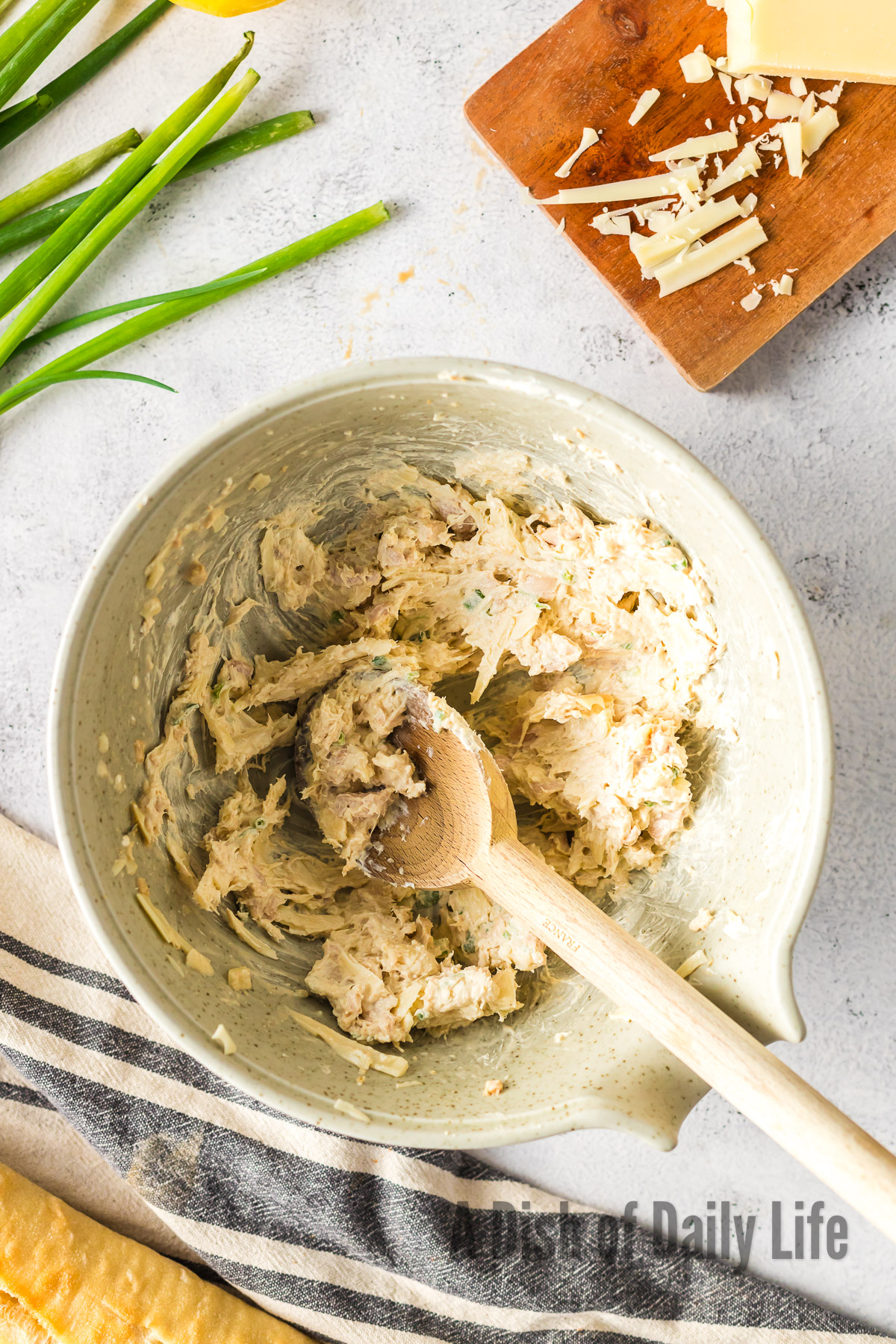 Creamy clam mixture mixed together in the bowl