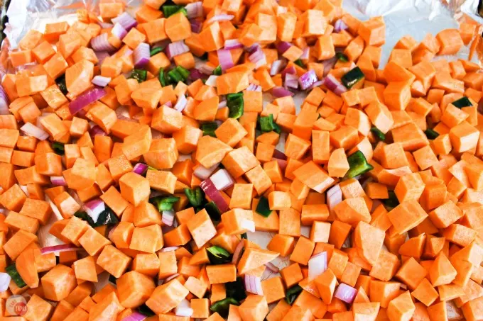 This sweet potato salad is great for Summer! The combination of sweet potatoes, black beans, crunchy pumpkin seeds, and juicy pomegranate seeds makes a great side dish or full lunch!