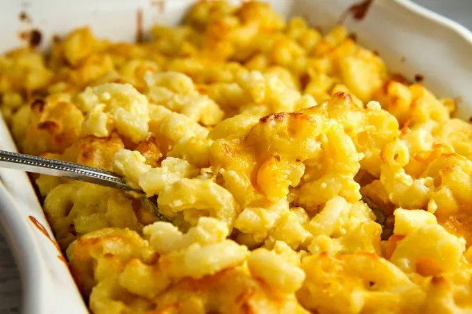 mac and cheese baked in a casserole dish