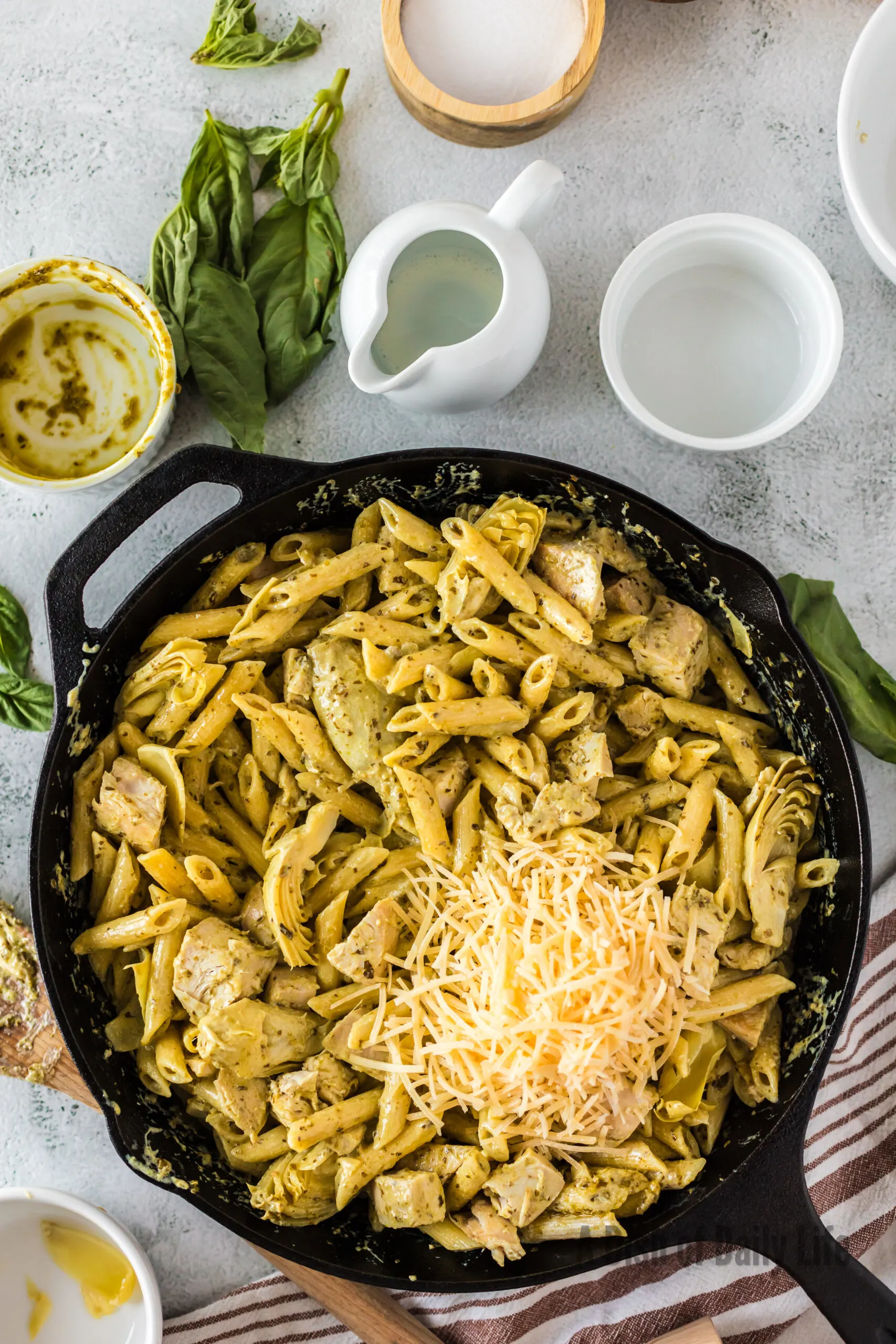 shredded parmesan cheese added to pasta mixture.