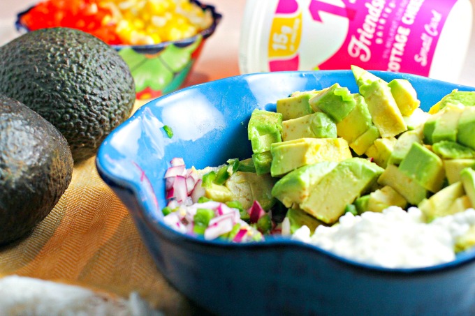 Fiesta Guacamole...a healthy snack packed with vegetables and extra protein for fueling muscle recovery after a tough workout! This easy to make appetizer recipe is perfect for parties and Mexican night as well!