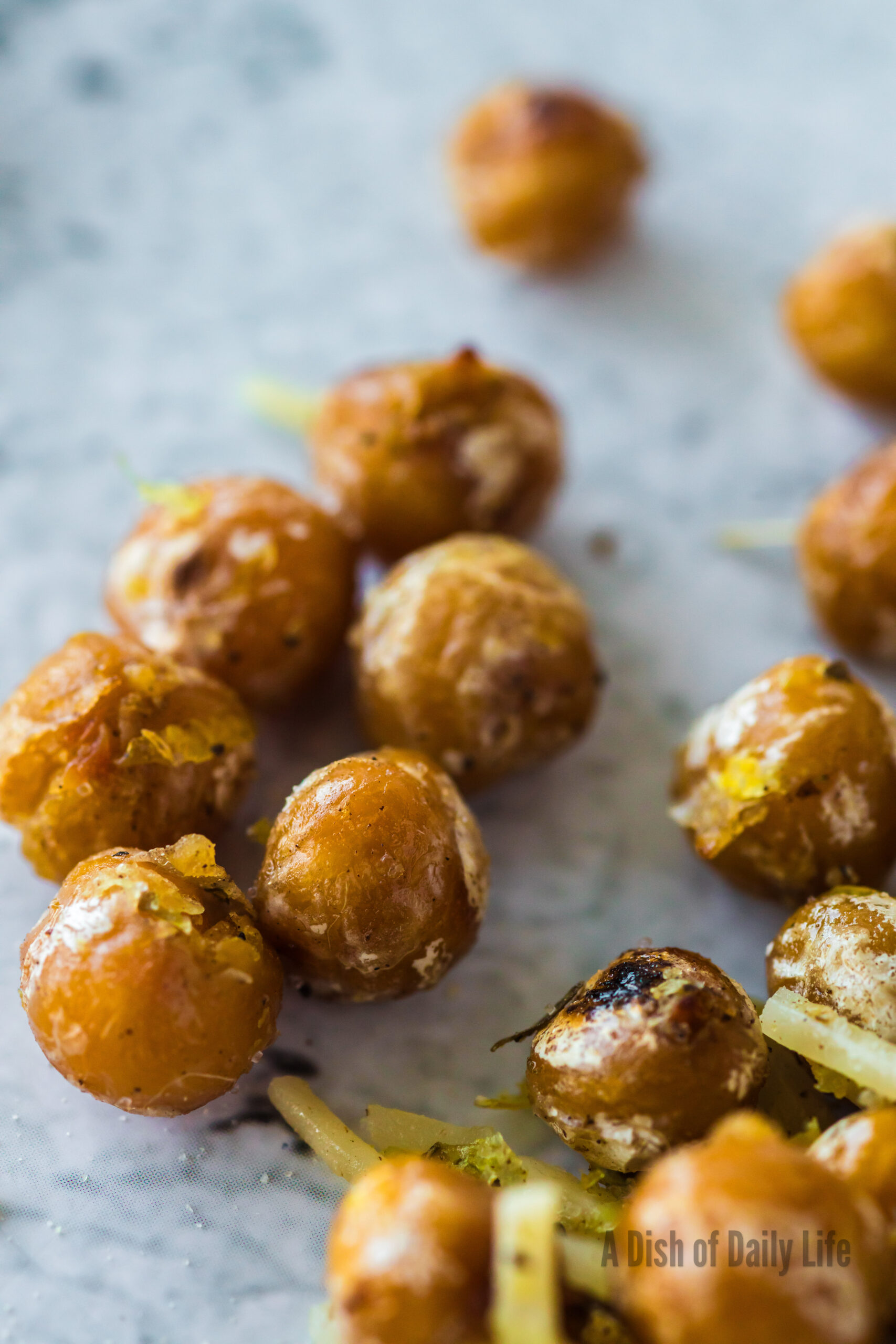 a few chickpeas scattered on counter and ready to eat