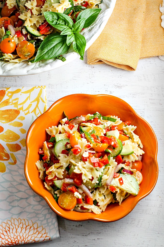 Our Summer Pasta Salad, packed with farmer's market veggies, is the perfect side dish for any potluck or summer BBQ. It's like a burst of summer in every bite! People will be going back for seconds and thirds...everyone will be asking you for the recipe!