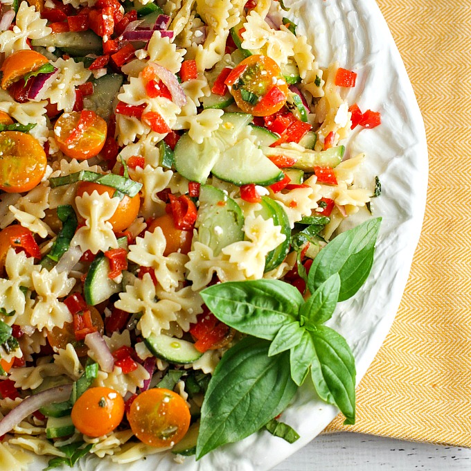 Our Summer Pasta Salad, packed with farmer’s market vegetables, is the perfect side dish for any potluck or summer BBQ. It’s like a burst of summer in every bite! Everyone will be asking you for the recipe!