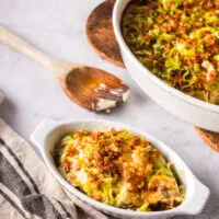 A small portion scooped out of casserole dish and onto a small dish.