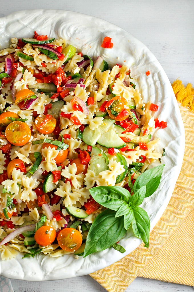 Our Summer Pasta Salad, packed with farmer’s market vegetables, is the perfect side dish for any potluck or summer BBQ. It’s like a burst of summer in every bite! Everyone will be asking you for the recipe!