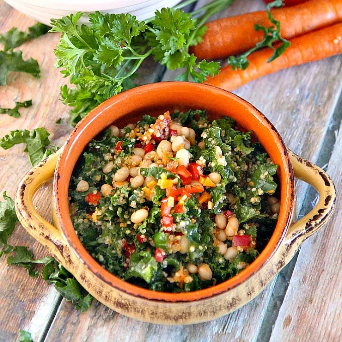 Delicious and nutritious, Lemony Kale Quinoa Salad is a colorful salad packed with lots of health benefits! A mix of kale, quinoa, white beans, peppers and carrots finished with a lemon vinaigrette, this salad is sure to be a new favorite!