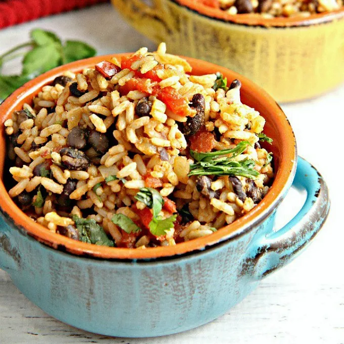 Mexican Rice and Beans…an easy versatile vegetarian dish! Use it as a side dish for Mexican night, use the leftovers as a filling for burritos along with chicken or beef, or add cheese and turn it into a Mexican bake.