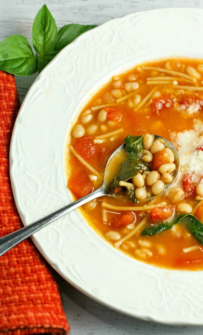 Pasta e Fagioli, a traditional Italian soup, is a comforting dish any time of year. Easy to make, healthy, and delicious, this Italian bean soup recipe makes for a flavor filled bowl every time! And it's a great source of protein and fiber as well! 