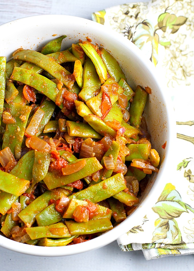 Pick some Romano beans up at the farmer's market this week! Flavorful and easy, Romano Beans with tomatoes is a side dish recipe that goes with just about anything. Definitely a family favorite!