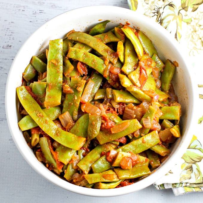 Pick some Romano beans up at the farmer's market this week! Flavorful and easy, Romano Beans with tomatoes is a side dish recipe that goes with just about anything. Definitely a family favorite!