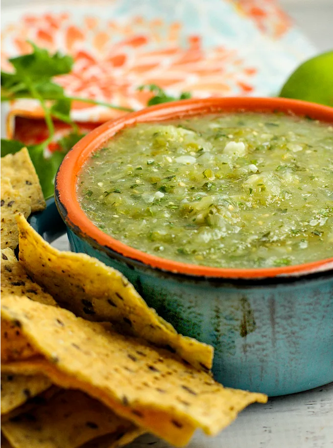 This authentic tangy Salsa Verde will be a hit on game day or Mexican night! It's a versatile recipe...great with chips and nachos, over burritos and enchiladas, as perfect as an accompaniment to just about any Mexican dish!