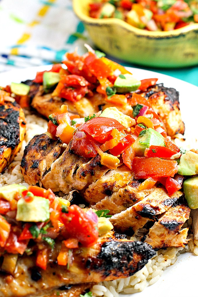 Fast, easy, delicious and healthy, this Tropical Glazed Chicken topped with salsa will make you feel like you're on an island vacation during dinner time! Only 30 minutes to make this recipe (not including the time to marinate)!