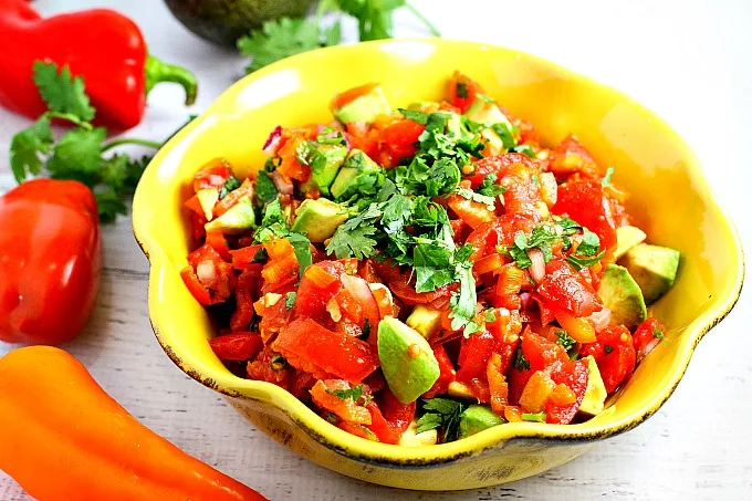 Fast, easy, delicious and healthy, this Tropical Glazed Chicken topped with salsa will make you feel like you're on an island vacation during dinner time! Only 30 minutes to make this recipe (not including the time to marinate)!