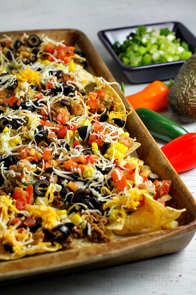 These Homemade Nachos, loaded with your favorite healthy fixings, are perfect for game day!