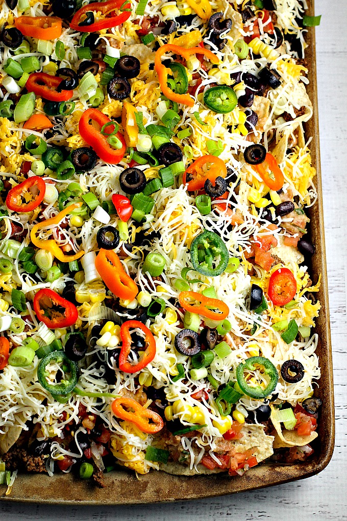 These Homemade Nachos, loaded with your favorite healthy fixings, are perfect for game day!