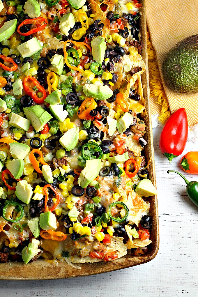 These Homemade Nachos, loaded with your favorite healthy fixings, are perfect for game day!