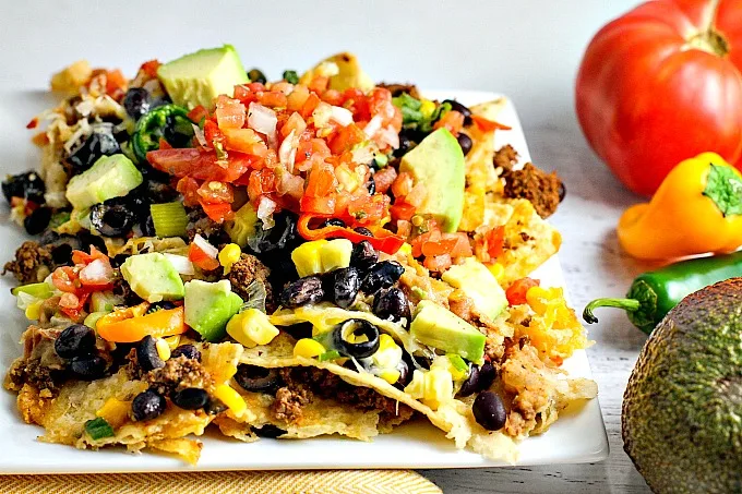 These Homemade Nachos, loaded with your favorite healthy fixings, are perfect for game day!