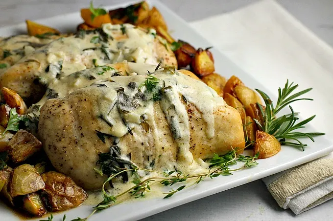 Lemon Herb Chicken with Roasted Potatoes...an easy, flavorful weeknight dinner recipe that is worthy of a special occasion as well! It's a family favorite in our house!