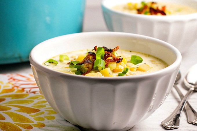 This easy (and delicious!) Corn Chowder is packed with sweet corn and potatoes, and topped with bacon and chopped green onions. A family favorite, it's hearty enough for a weeknight supper paired with a light salad, versatile enough for game day, and you can even use it as a holiday starter!