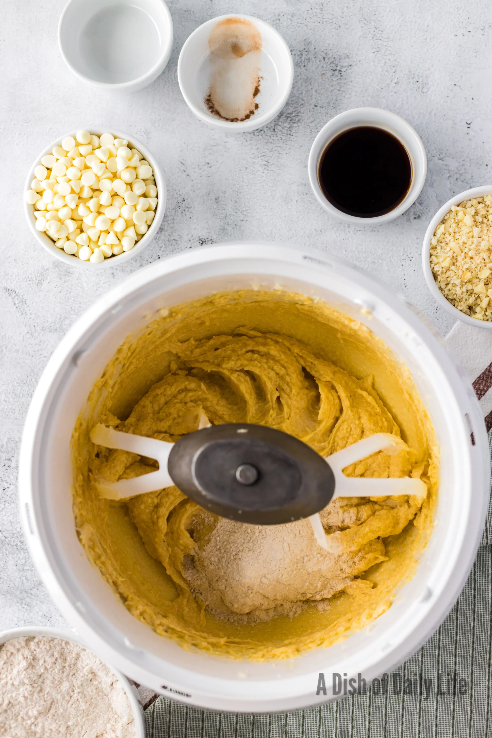 flour, cinnamon and salt added to mixer.