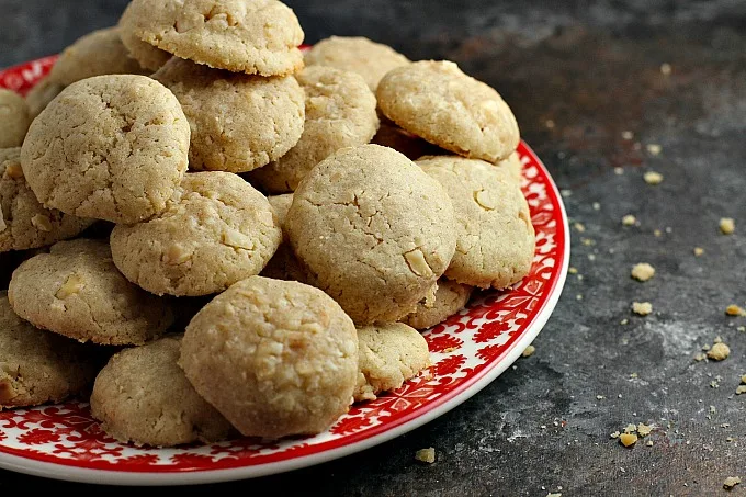 Macadamia Nut Butter Cookies...a soft, slightly chewy cookie that would be perfect for your holiday dessert table or Christmas cookie exchange. Dip them in white chocolate if you want to dress them up a little!