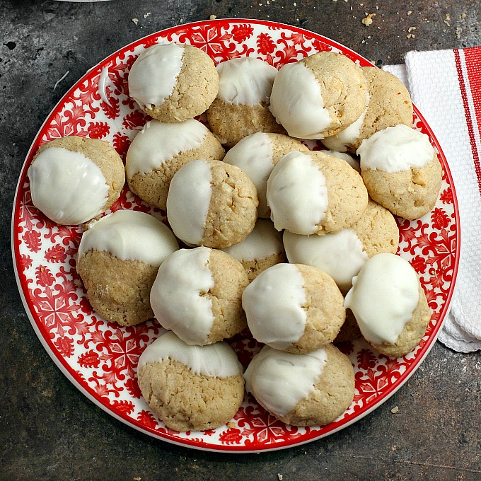 Macadamia Nut Butter Cookies...a soft, slightly chewy cookie that would be perfect for your holiday dessert table or Christmas cookie exchange. Dip them in white chocolate if you want to dress them up a little!