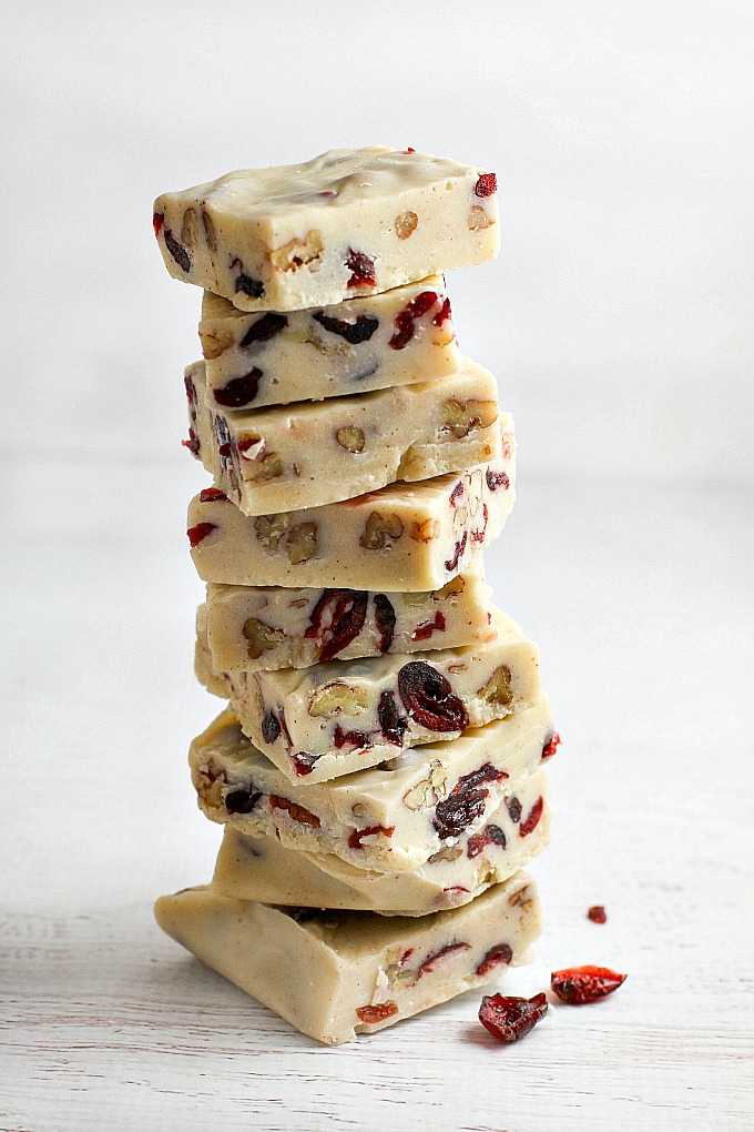 Easy to make White Chocolate Cranberry Pecan Fudge, with a hint of holiday spices, perfect for holiday entertaining and gift-giving!