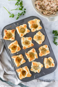 Baked puff pastry shells in muffin tin