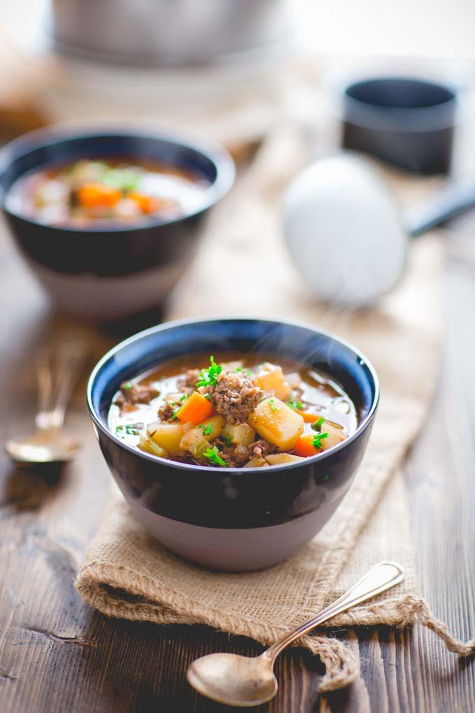 Quick Beef Stew...this stove-top version features lean ground beef, is naturally gluten free, full of rich flavor and only takes 45 minutes to make! It's a comfort food dish the whole family will love!