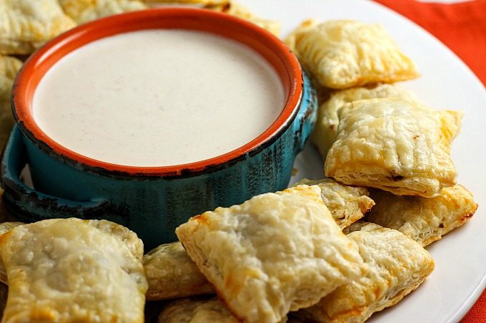 These Mini Beef Wellingtons with Horseradish Cream are an elegant appetizer, perfect for special occasions! Your game day crowd will love them too though!