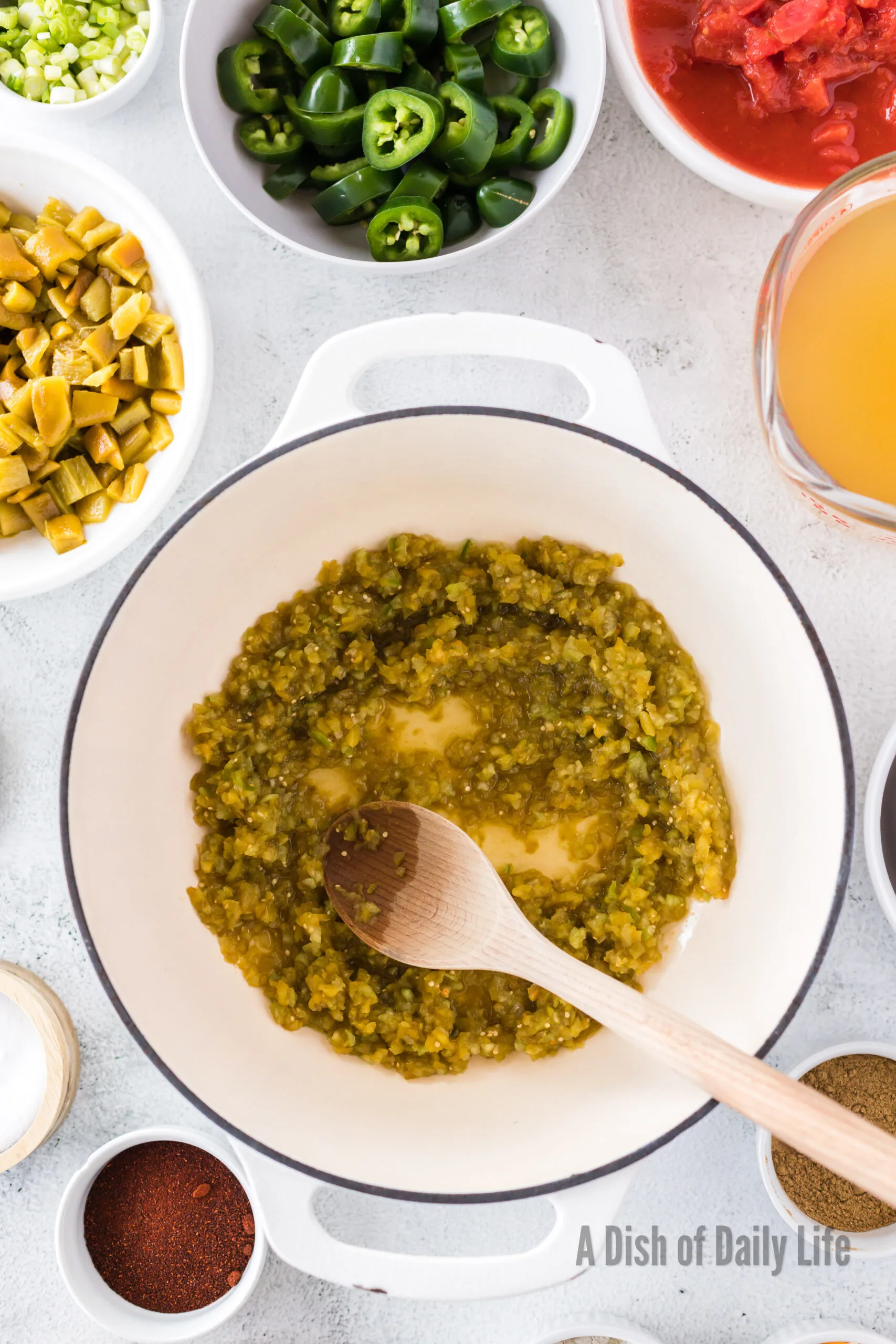 Blended green chilies and tomatillos in soup pot