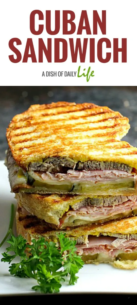 This Cuban Sandwich is packed with flavor -- a mouthwatering combination of Cuban pork, ham, swiss cheese, and pickles, grilled to golden perfection!