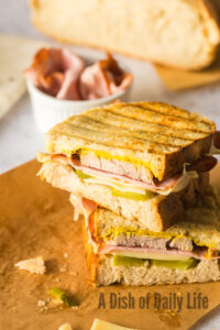 top angled view of sliced sandwich stacked on top of each other.