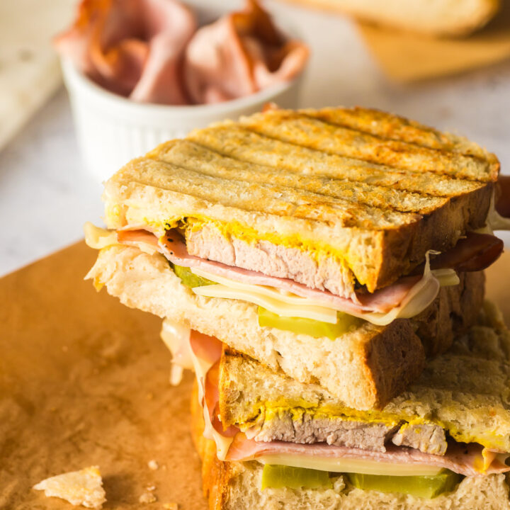 top angled view of sliced sandwich stacked on top of each other.