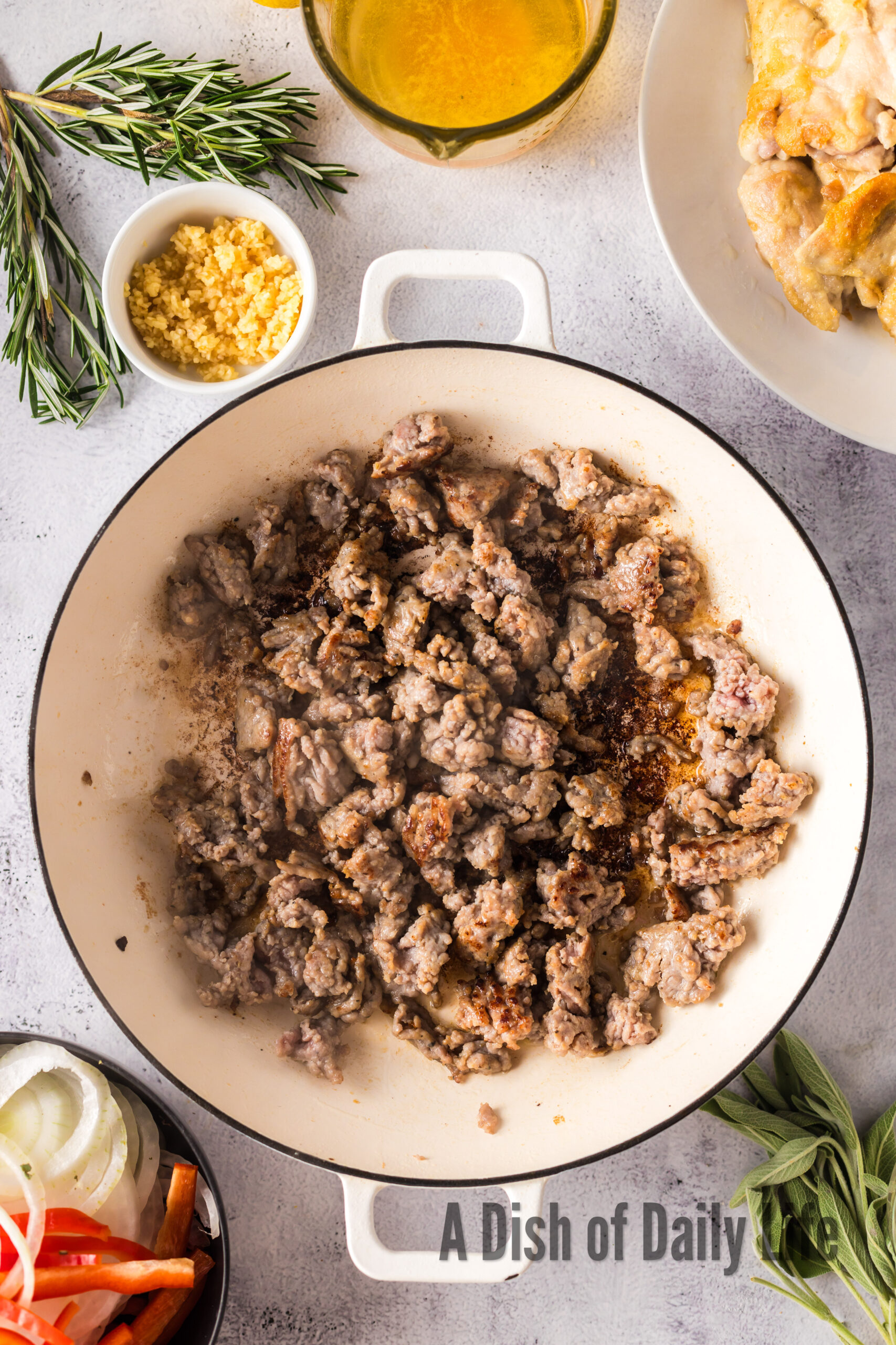 Sausage cooked in Dutch oven.