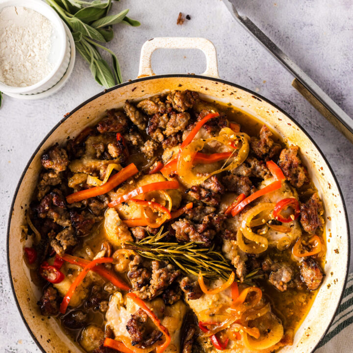 Cooked chicken and sausage in Dutch oven. Ready to serve.