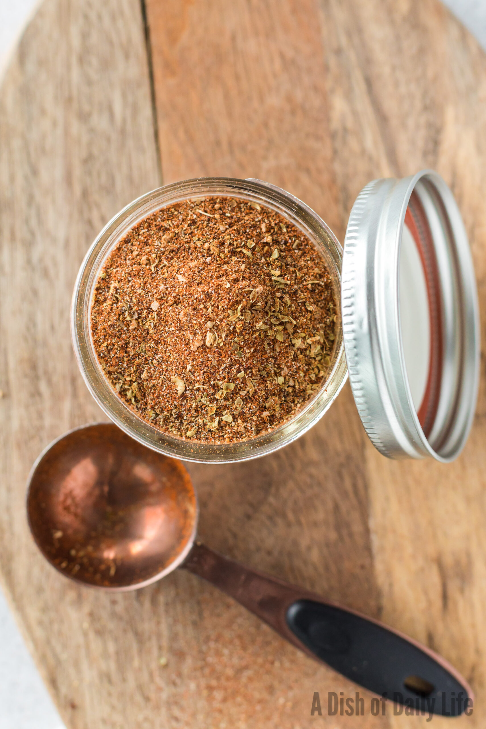 seasoning in a small jar with lid on the side