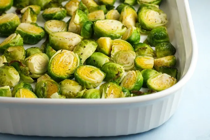 Brussels Sprouts Gratin with bacon...roasted brussels sprouts are paired with a rich cheesy cream sauce, perfect for any holiday occasion! Side dishes | Easter | Thanksgiving | Christmas | Holiday side dishes