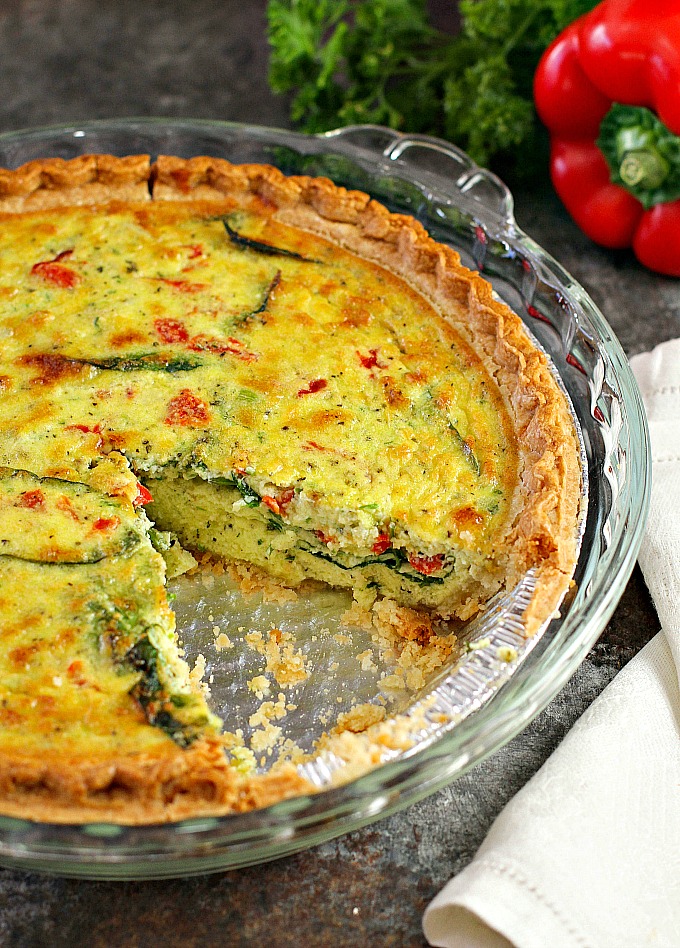 Simple, easy and delicious, this Spinach Quiche with Artichokes and Roasted Red Peppers is perfect for an every day breakfast or holiday brunch. Serve with a side of fruit or salad.